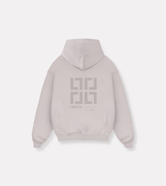 Creative House hoodie in sand colour showcasing its tone to tone back print