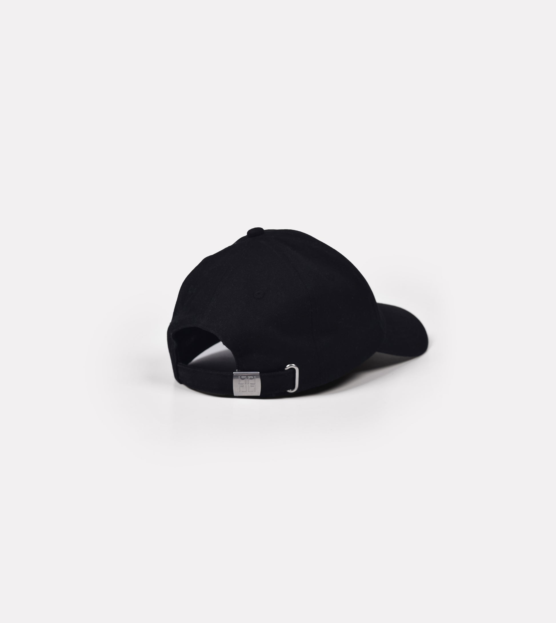 Back view of LIMITED. black dad hat with adjustable strap and metal buckle